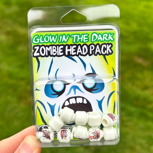 Glow in the Dark Zombie Head Pack by BrickTactical in blister card packaging